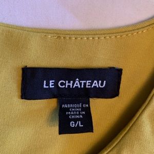 le chateau Tops - Le chateau ponte mustard peplum top NWOT large le chateau Tops - Le chateau ponte mustard peplum top NWOT large